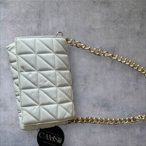 This chic midsize rectangular quilted purse